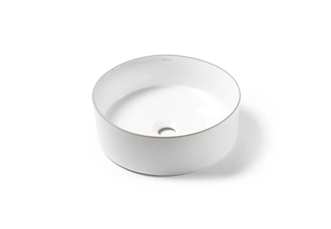 Beige trim round bathroom sink