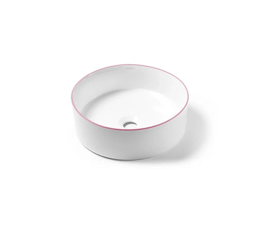 Magenta trim round bathroom sink
