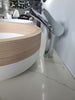 Lucca Solid Surface bathroom vessel sink. Natural wood