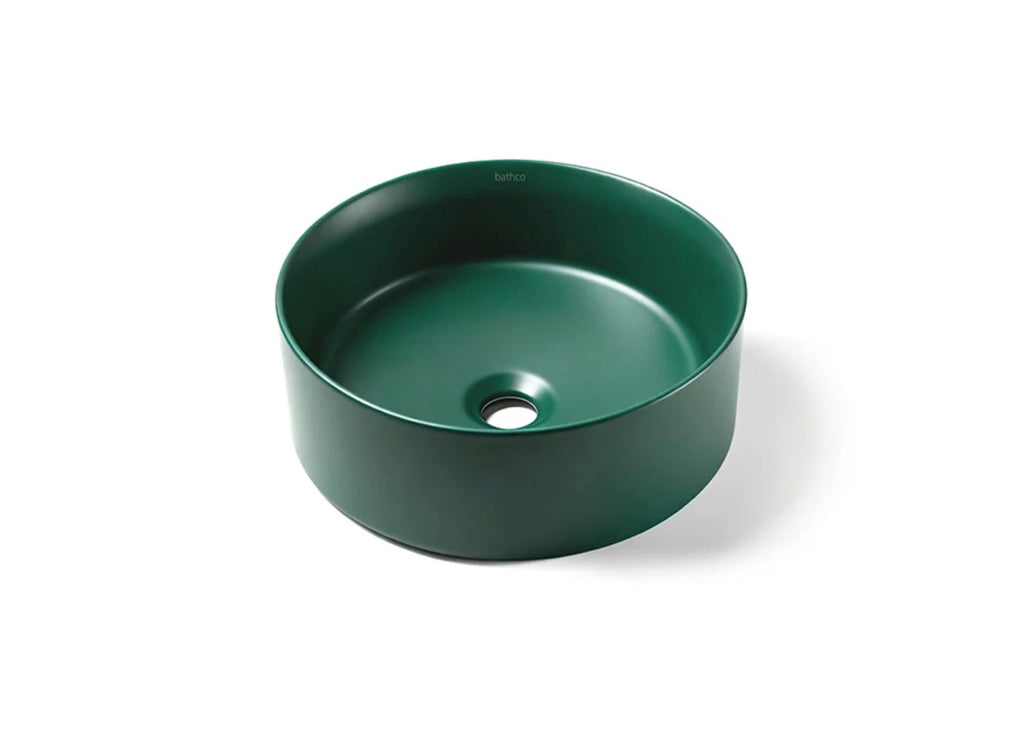 Dark green round bathroom sink