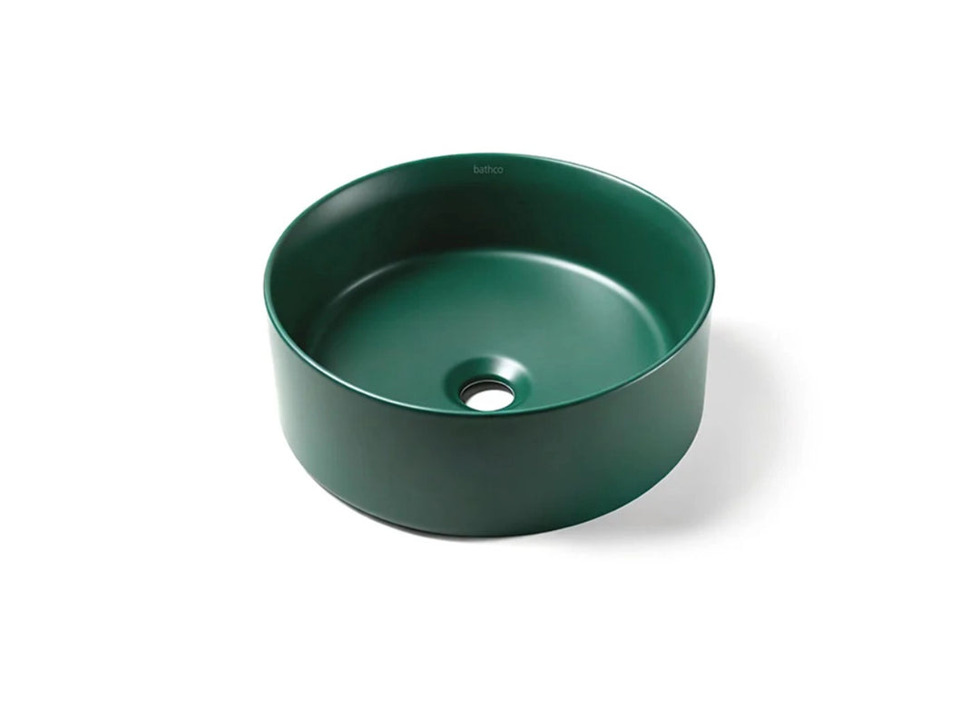 Dark green round bathroom sink