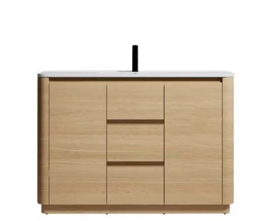 Hana free standing bathroom vanity. Natural Oak. Curve bathroom cabinets Secret Bath