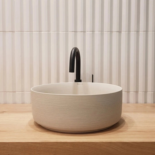 Carnac Crude porcelain round vessel sink. Modern bathroom bowl sink.
