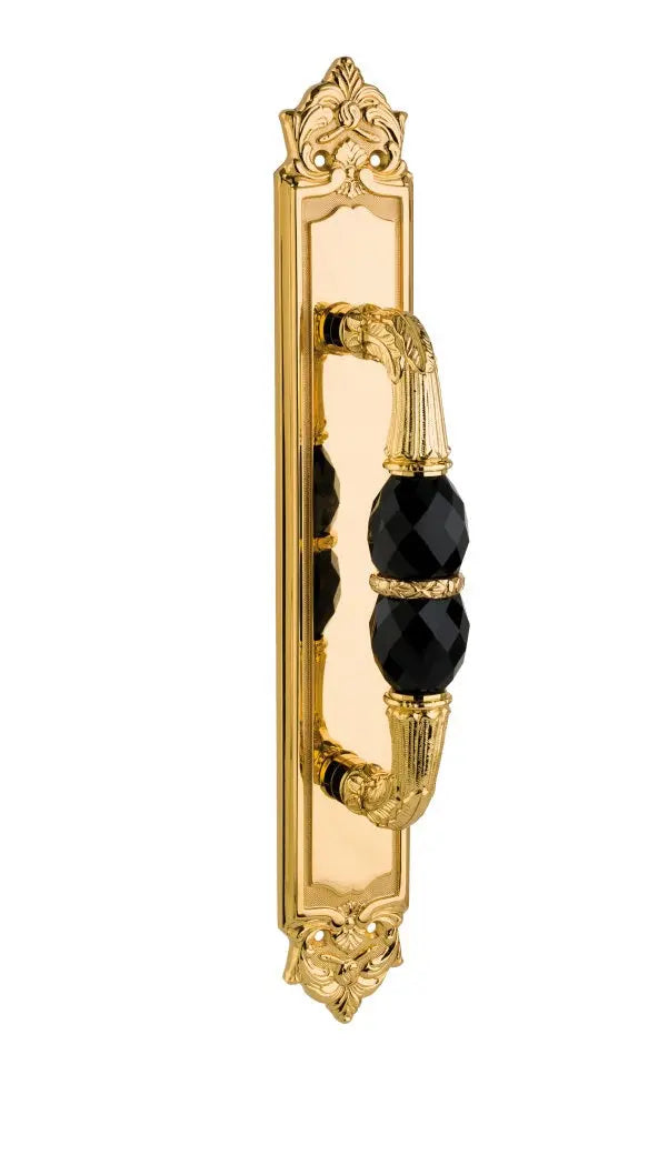 Polished gold Luxury Pull handle on plate with black Swarovski crystals.