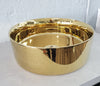 Dinan polished gold bathroom vessel sink. Shiny finish