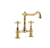 Bourgeois Two holes bathroom sink faucet. Polished gold