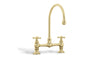 Victorian Two holes bathroom sink faucet. Polished gold